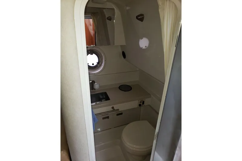 Slide: The Image of Bathroom interior of 2010 Sea Ray Sundancer 310 yacht with sink and toilet. - 7