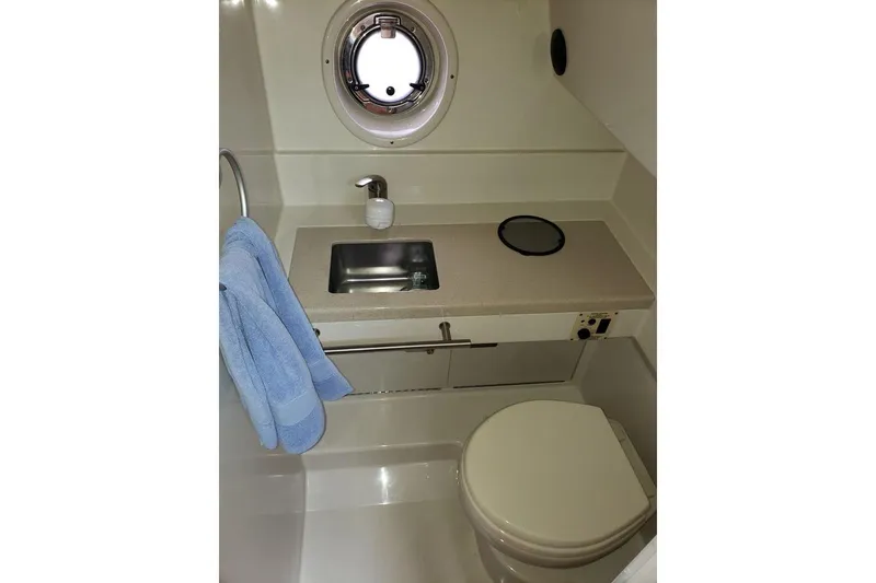 Slide: The Image of Bathroom interior of 2010 Sea Ray Sundancer 310 yacht with sink and toilet. - 8