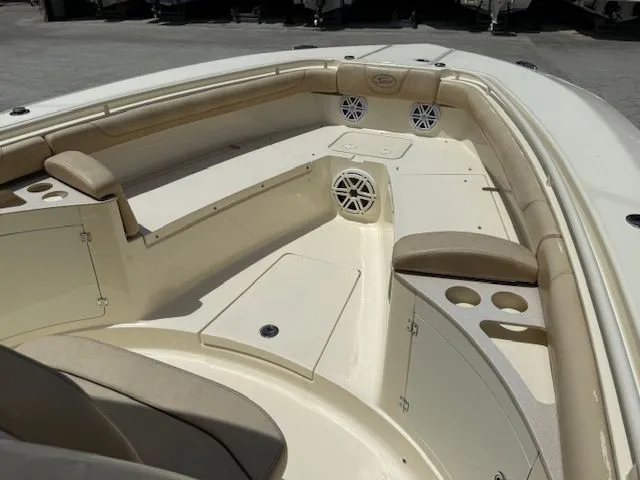Slide: The Image of Interior view of a 2017 Scout 275 LXF boat with seating. - 12