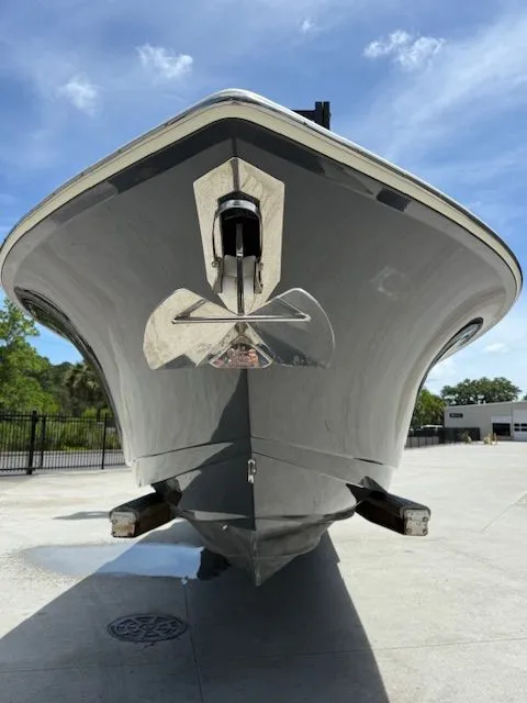 Slide: The Image of Scout 275 LXF 2017 boat front view on a trailer. - 2