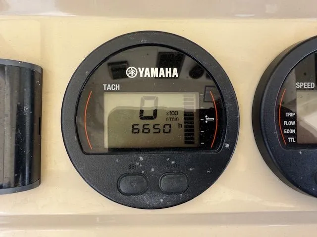 Slide: The Image of Yamaha tachometer on Scout 275 LXF boat, displaying 6650 hours. - 23