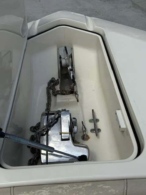 Slide: The Image of Anchor compartment of 2017 Scout 275 LXF boat with chain. - 26
