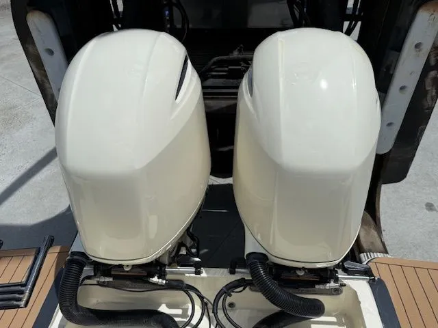 Slide: The Image of Two outboard engines on a 2017 Scout 275 LXF boat. - 6