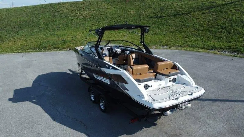 Slide: The Image of 2018 Scarab 255 ID Wake Ed boat on trailer, side view. - 10