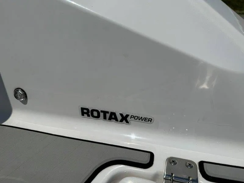 Slide: The Image of Close-up of Rotax Power logo on a 2018 Scarab 255 ID Wake Ed. - 14
