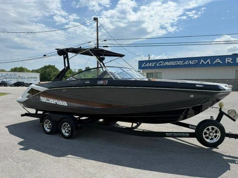 Slide: The Image of 2018 Scarab 255 ID Wake Ed boat on trailer at Lake Cumberland Marina. - 21