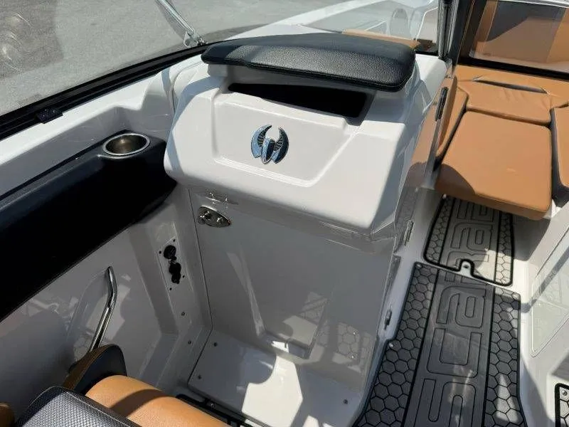 Slide: The Image of Interior of a 2018 Scarab 255 ID Wake Ed boat with brown seating. - 37