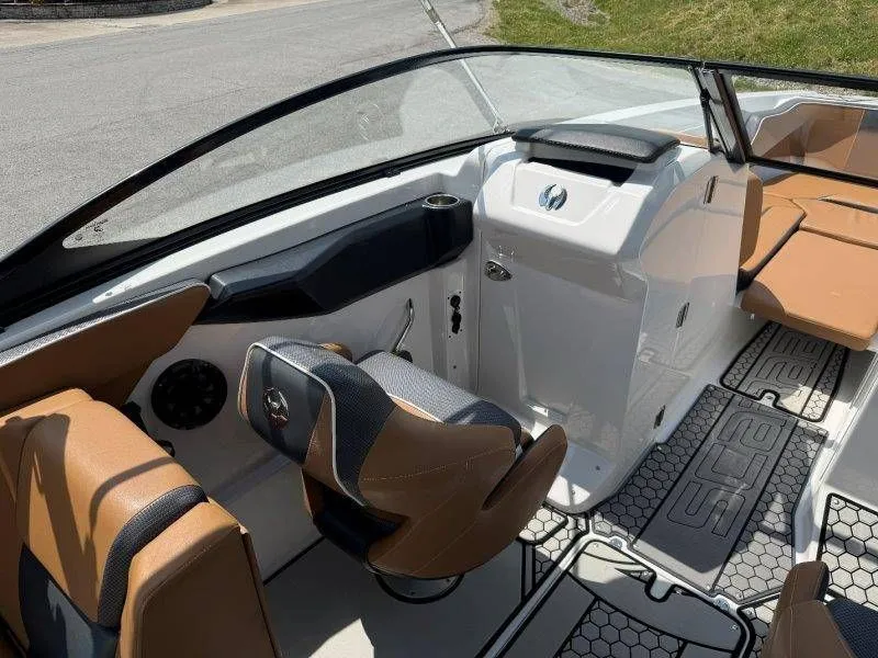 Slide: The Image of Interior of a 2018 Scarab 255 ID Wake Ed boat with brown seating. - 42