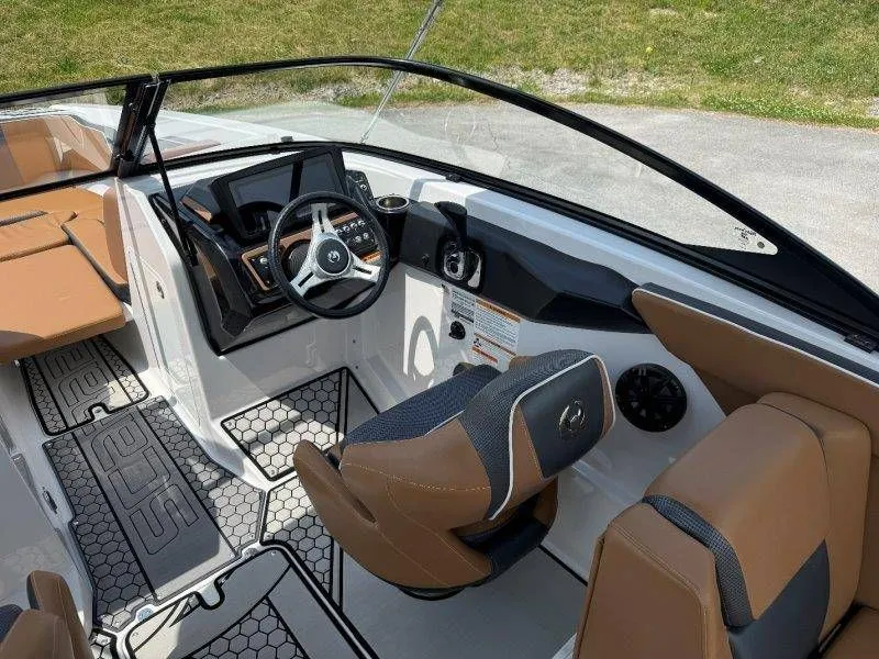 Slide: The Image of Interior of 2018 Scarab 255 ID Wake Ed with steering wheel and seats. - 43