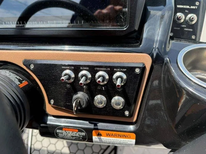 Slide: The Image of Dashboard of a 2018 Scarab 255 ID Wake Ed boat. - 48