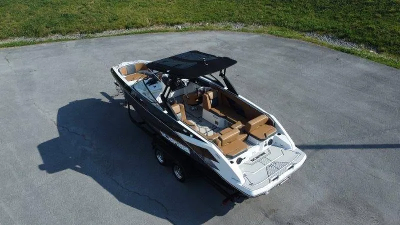 Slide: The Image of 2018 Scarab 255 ID Wake Ed boat on trailer, aerial view. - 6