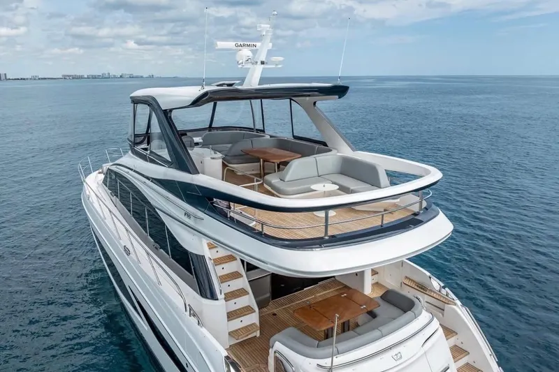 Slide: The Image of Luxurious 2023 Princess F65 yacht cruising on open sea with elegant deck design. - 24