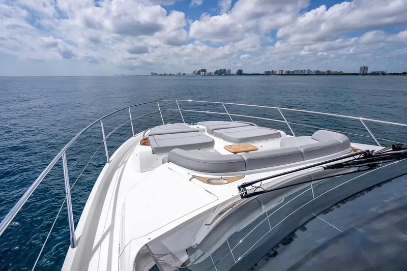 Slide: The Image of Luxurious 2023 Princess F65 yacht with sun loungers on open sea. - 25