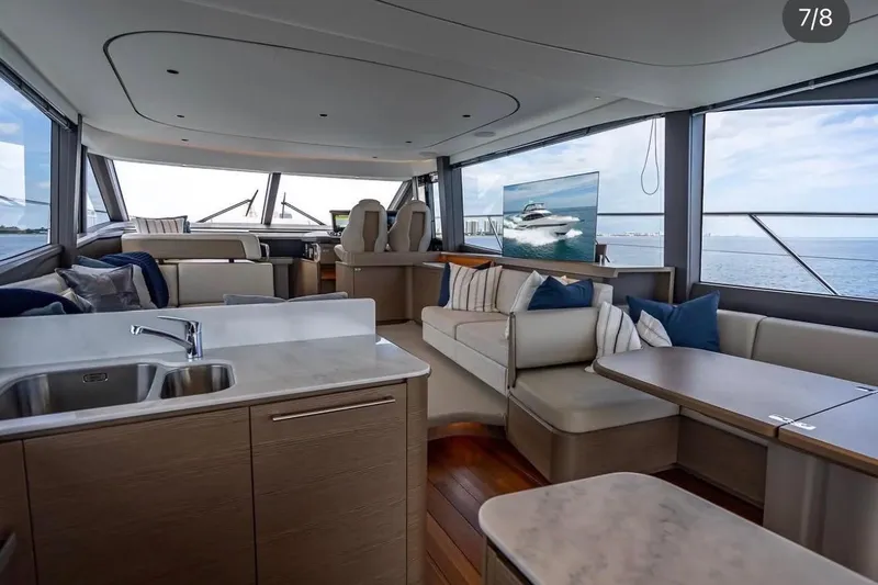 Slide: The Image of Luxurious interior of 2023 Princess F65 yacht with modern seating and ocean view. - 28