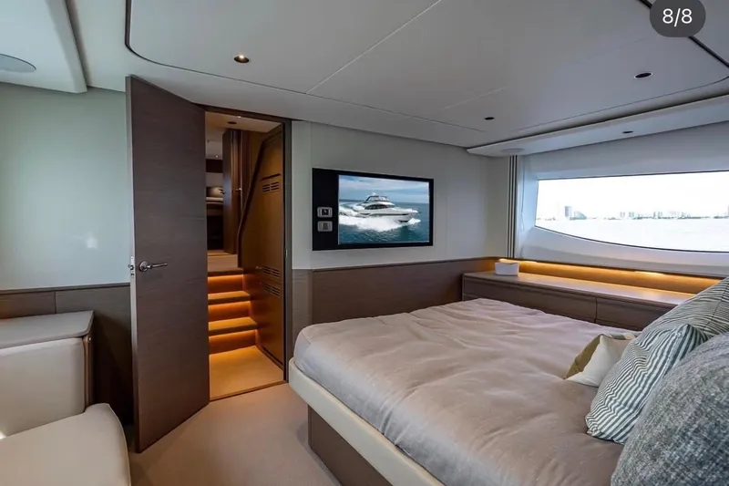 Slide: The Image of Luxurious bedroom interior of 2023 Princess F65 yacht with modern design and scenic window view. - 29