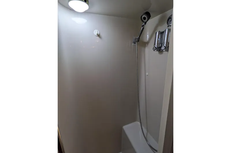 Slide: The Image of Shower area in 1991 Californian 55 Cockpit Motor Yacht, featuring modern fixtures. - 48