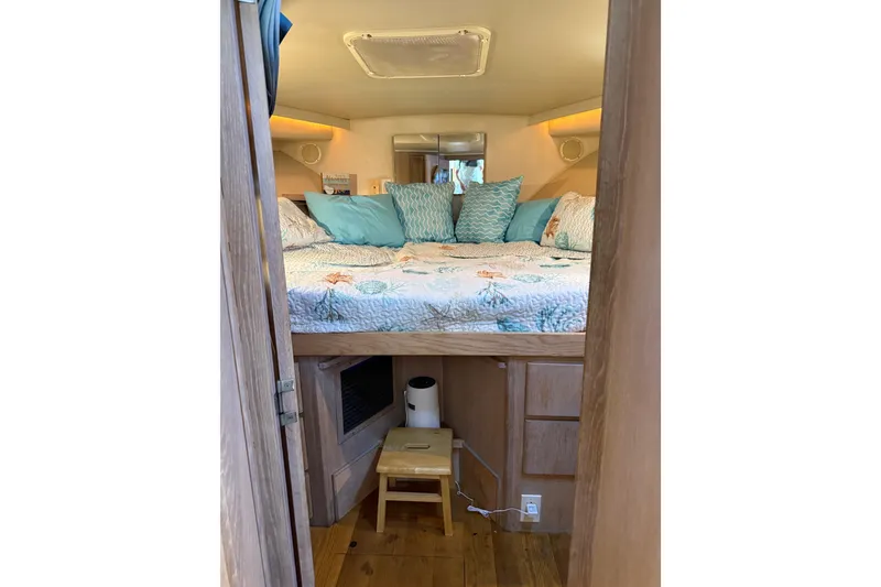 Slide: The Image of Cozy bedroom interior of 1991 Californian 55 Cockpit Motor Yacht with nautical decor. - 65