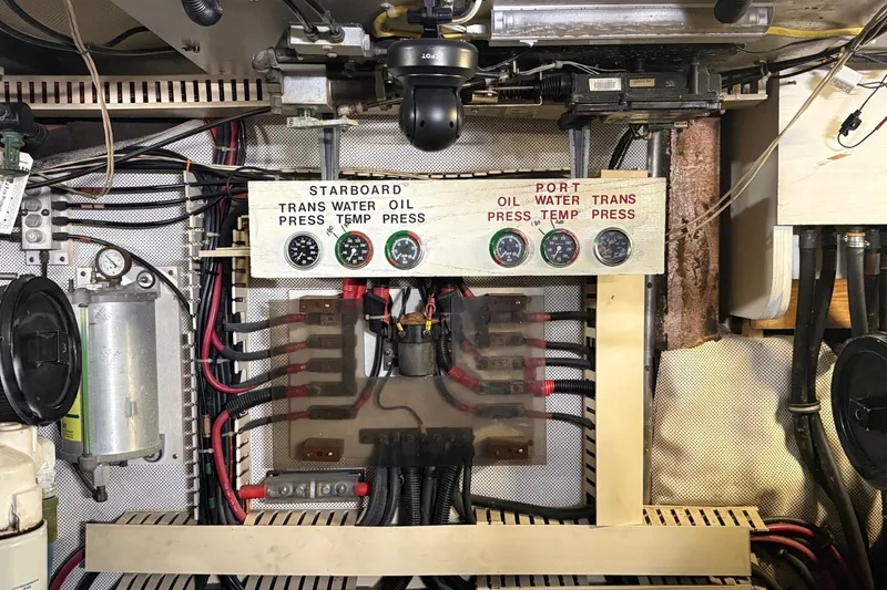 Slide: The Image of Engine room gauges and wiring of a 1991 Californian 55 Cockpit Motor Yacht. - 73