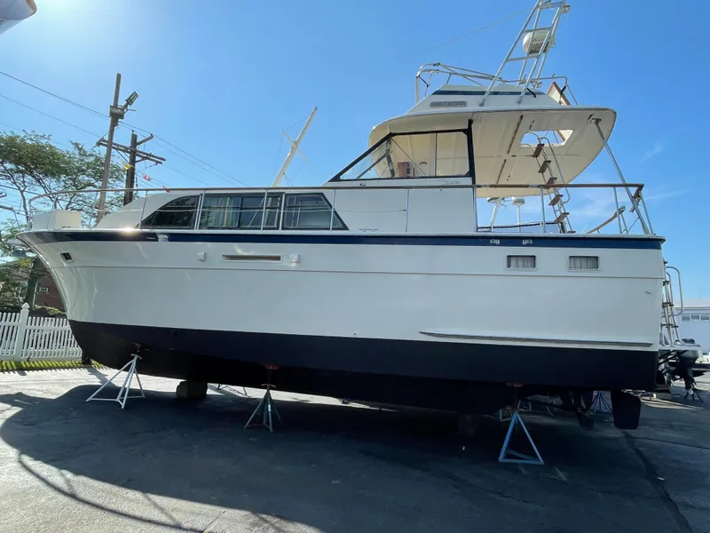 The Image of 1978 Hatteras 43 Double Cabin on stands outdoors. - 0