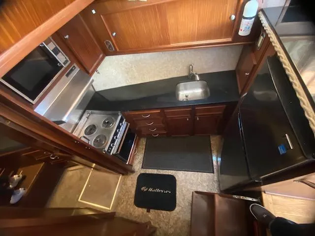 Slide: The Image of 1978 Hatteras 43 Double Cabin yacht kitchen interior. - 7