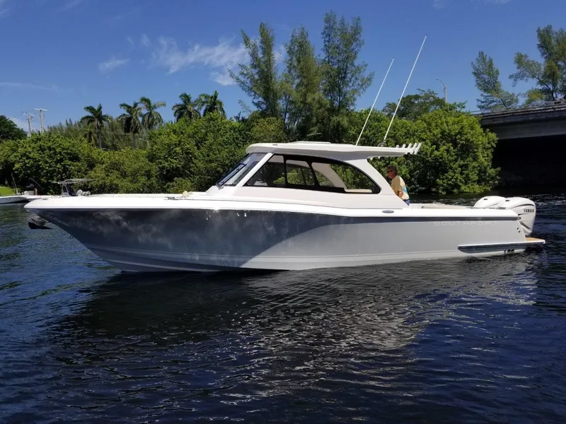 The Image of 2021 Southport 33 DC boat on calm water. - 0