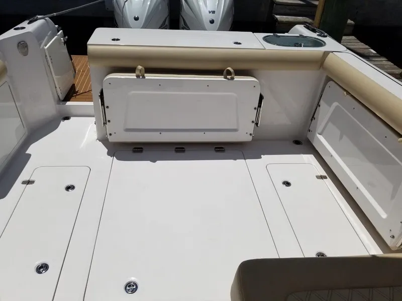 Slide: The Image of Interior of a 2021 Southport 33 DC boat with storage compartments. - 10