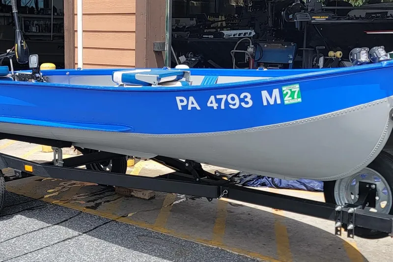 Slide: The Image of 1966 Sea Nymph V-14 boat in blue and gray on a trailer, registration PA 4793 M. - 7