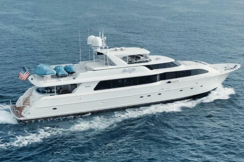 Slide: The Image of Luxury 2002 Westport 112 yacht cruising on open sea, displaying sleek design and elegance. - 42
