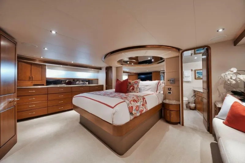 Slide: The Image of Luxurious bedroom interior of 2002 Westport 112 yacht with elegant wood furnishings. - 19