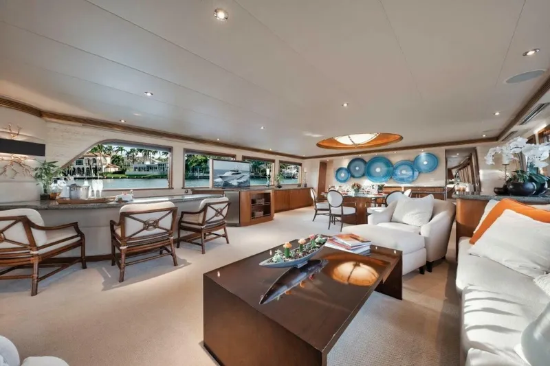 Slide: The Image of Luxurious interior of 2002 Westport 112 yacht with elegant seating and decor. - 16