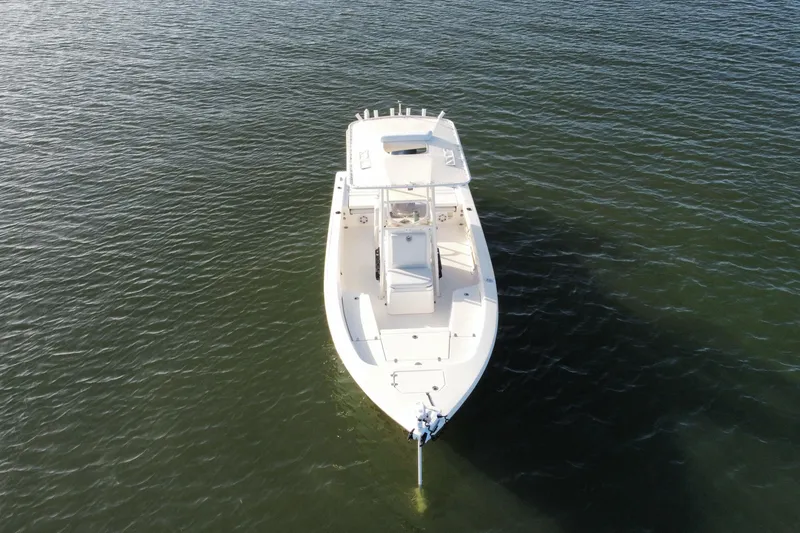 Slide: The Image of Aerial view of 2017 Pathfinder 2200 TRS boat on calm water. - 10