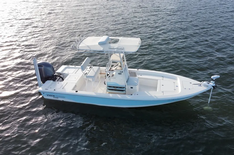 Slide: The Image of 2017 Pathfinder 2200 TRS boat on water, featuring sleek design and modern equipment. - 6