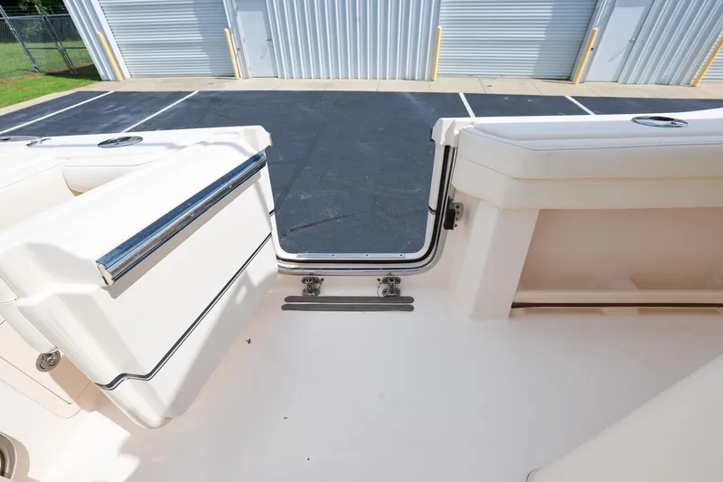 Slide: The Image of 2020 Grady-White Canyon 336 boat interior with open transom door. - 12