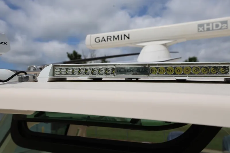 Slide: The Image of LED light bar and Garmin radar on 2020 Grady-White Canyon 336 boat. - 25