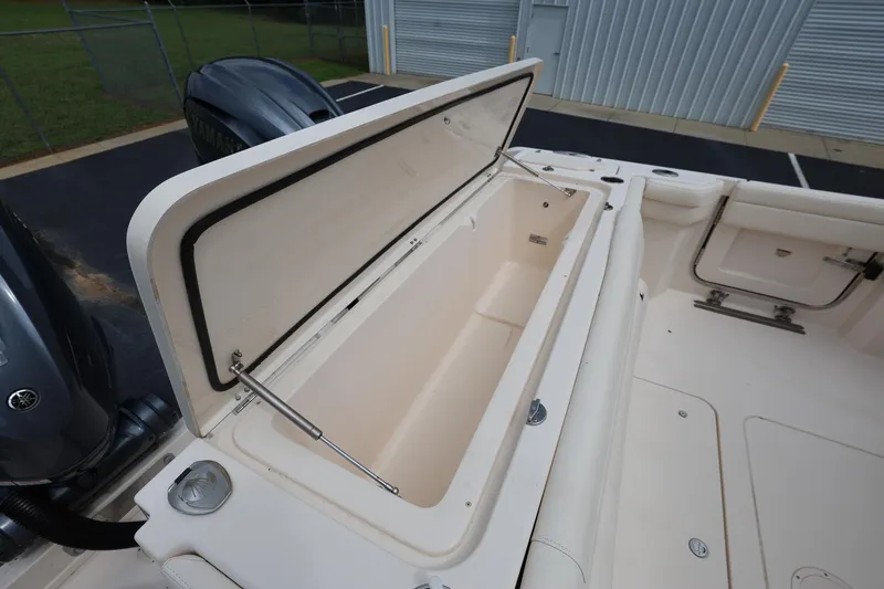 Slide: The Image of Open storage compartment on 2020 Grady-White Canyon 336 boat deck. - 33