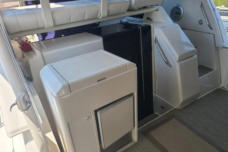 Slide: The Image of Interior view of 2003 Carver 356 Aft Cabin Motor Yacht with seating and storage. - 28