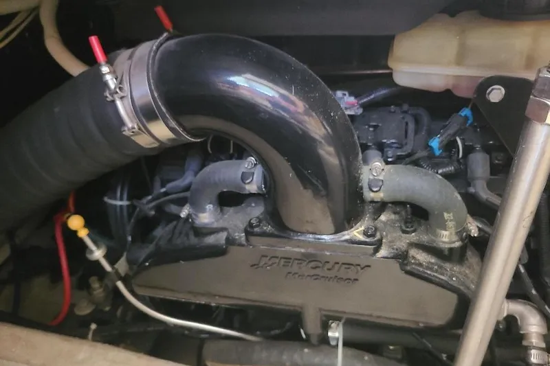 Slide: The Image of Engine compartment of a 2003 Carver 356 Aft Cabin Motor Yacht, featuring Mercury components. - 37