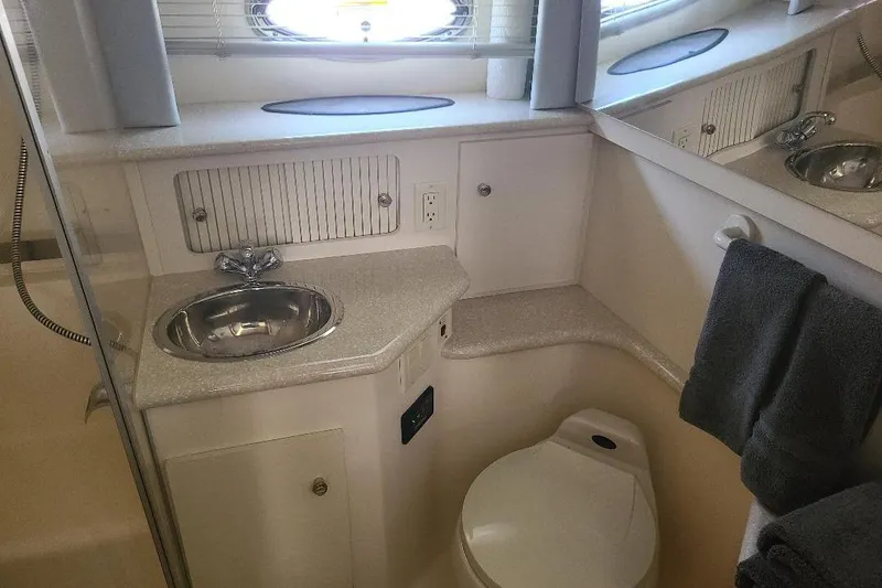 Slide: The Image of Bathroom interior of 2003 Carver 356 Aft Cabin Motor Yacht with sink and toilet. - 7