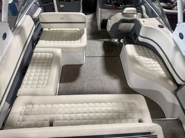 Slide: The Image of Interior of a 2017 Cobalt R7 boat with beige upholstered seating. - 12