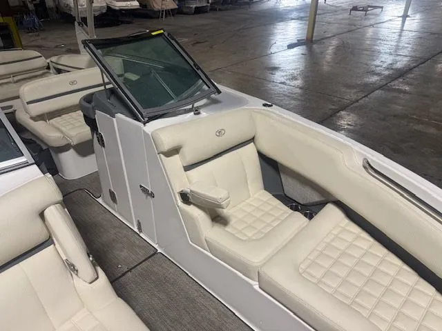 Slide: The Image of Interior of a 2017 Cobalt R7 boat with white leather seating. - 4