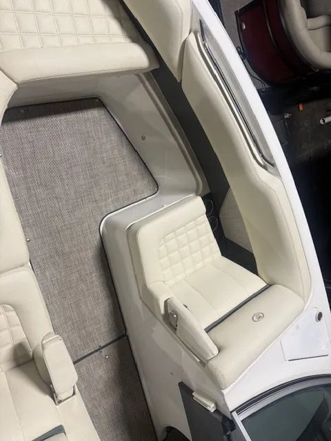 Slide: The Image of Interior of a 2017 Cobalt R7 boat with white leather seats. - 5