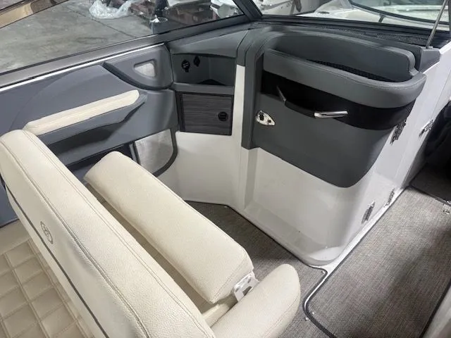 Slide: The Image of Interior of a 2017 Cobalt R7 boat with beige seating. - 8