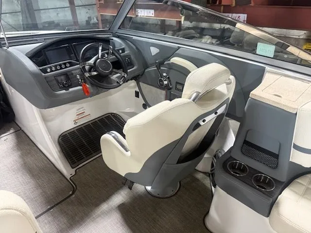 Slide: The Image of Interior of a 2017 Cobalt R7 boat with steering console. - 9