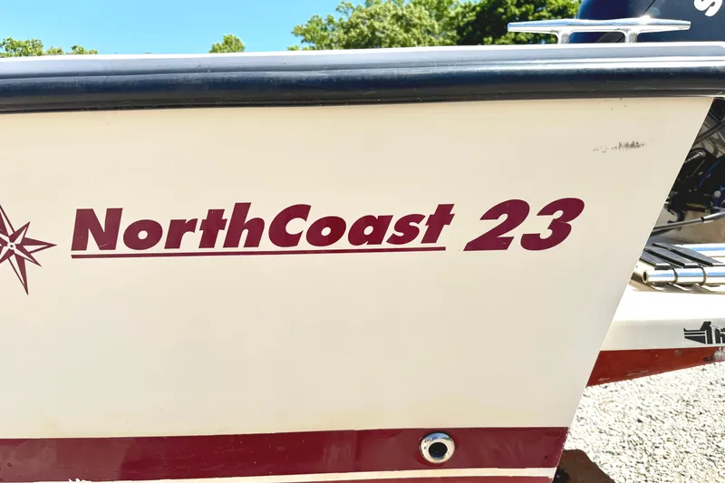 Slide: The Image of NorthCoast 23 boat side view, showcasing model name and logo, 2007. - 1
