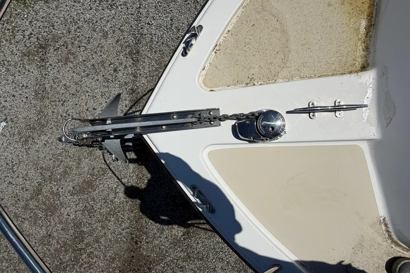 Slide: The Image of Bow of 2007 NorthCoast 235 HT boat with anchor and chain mechanism. - 27