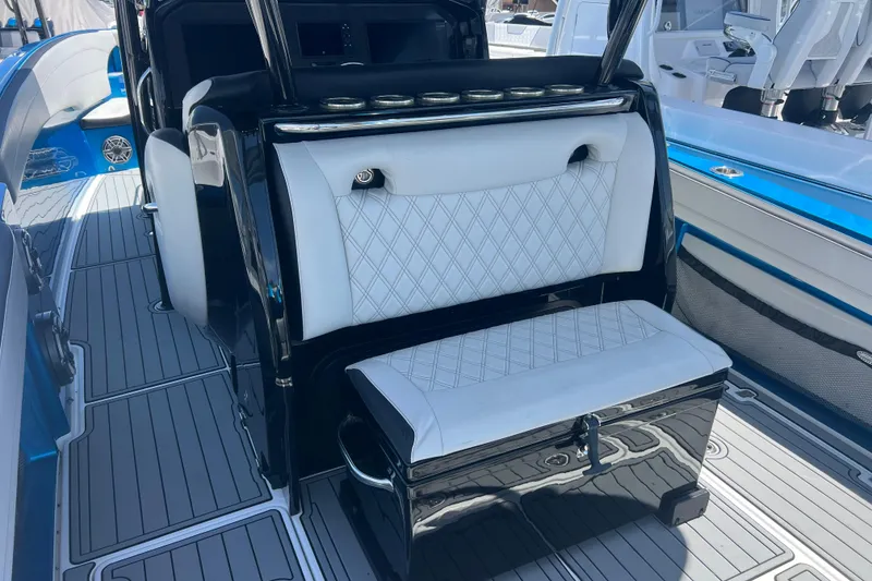 Slide: The Image of 2021 Nor-Tech 340 Sport Center Console interior with sleek seating and modern design. - 10