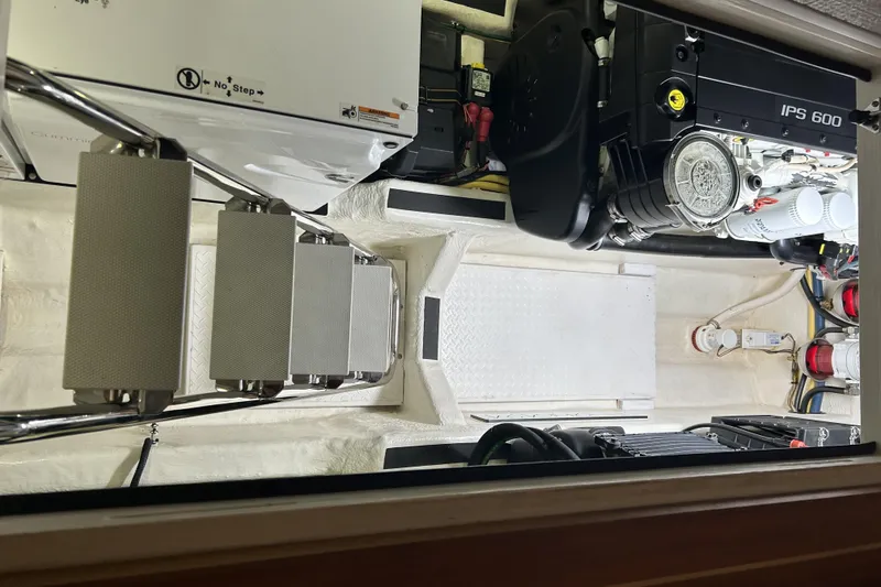Slide: The Image of Engine room of 2016 Sabre 42 Salon Express with IPS 600 engine and ladder access. - 11