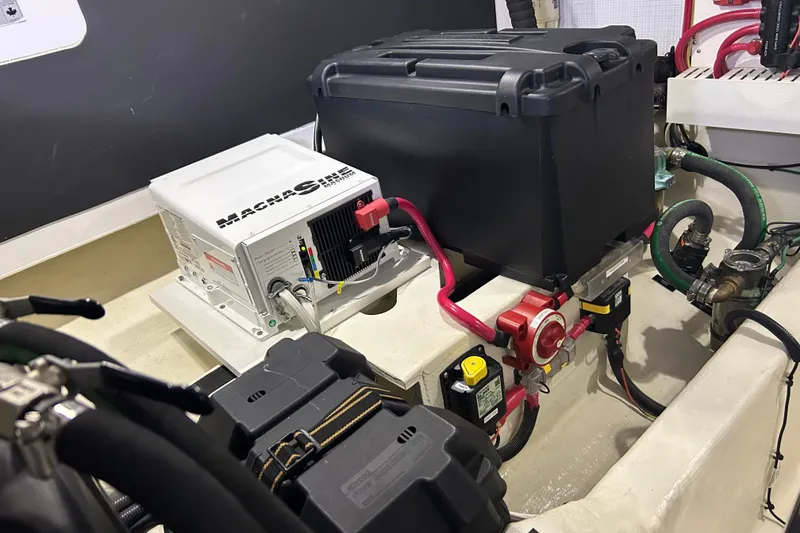 Slide: The Image of Engine room of 2016 Sabre 42 Salon Express with electrical components and wiring. - 15