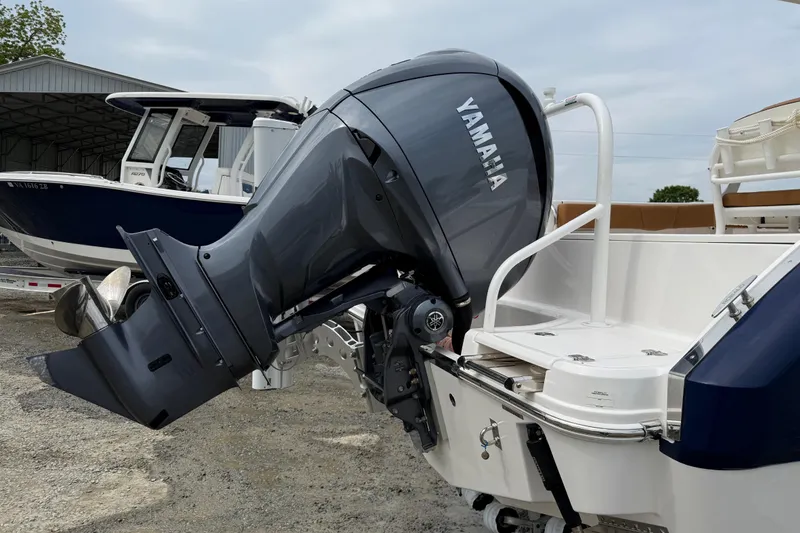Slide: The Image of 2025 Robalo R232 Explorer with Yamaha outboard motor. - 17