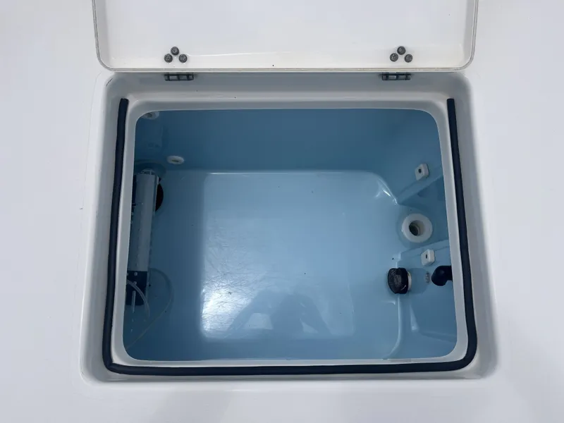 Slide: The Image of Open storage compartment in 2022 Pathfinder 2400 boat. - 28